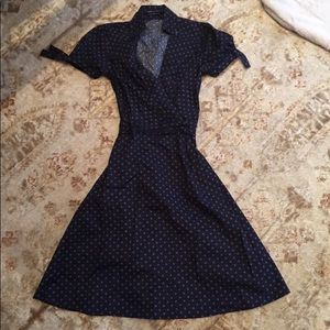 Polka dot faux wrap dress.